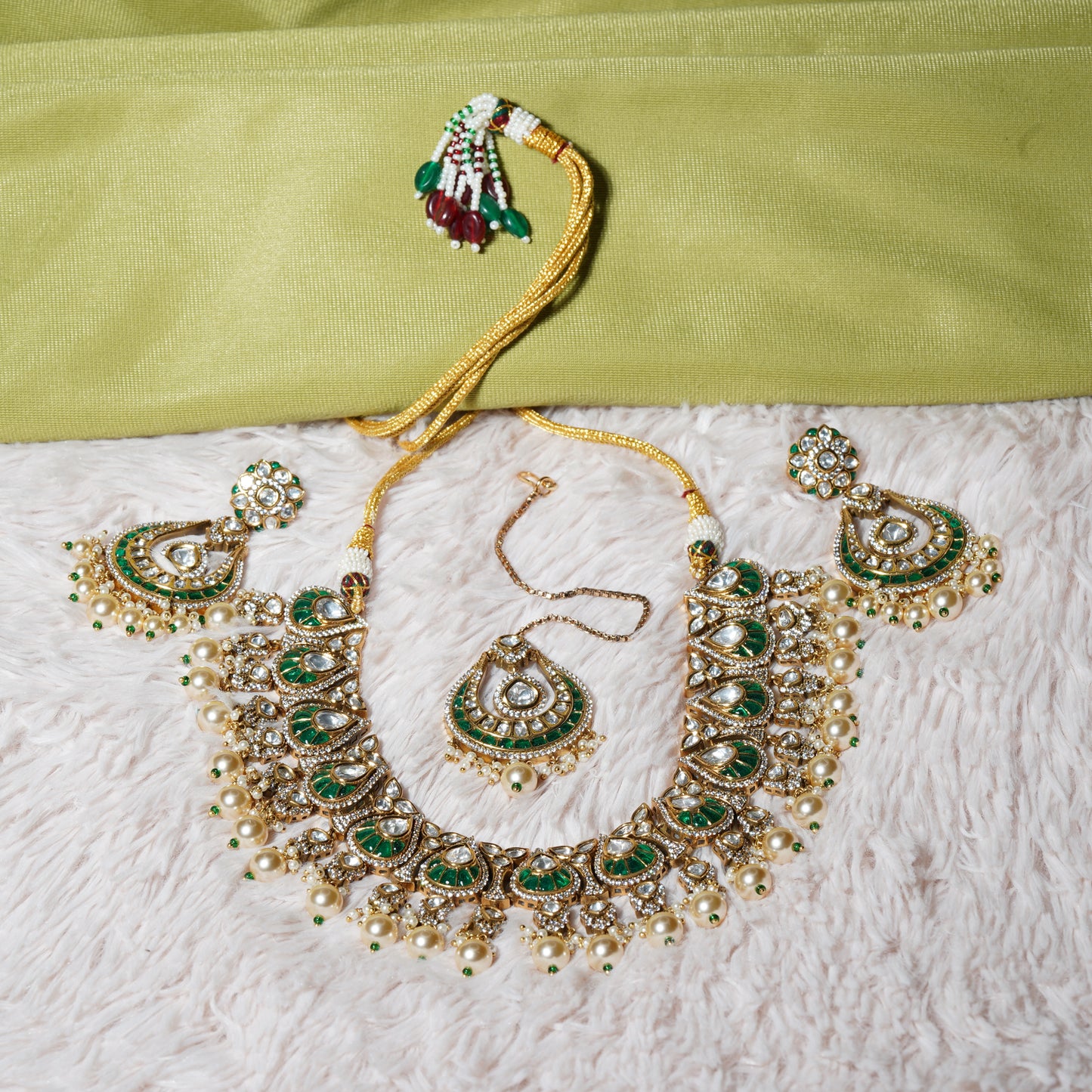 Emerald Mayura Charm Set.