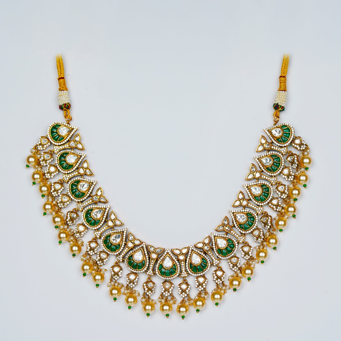 Emerald Mayura Charm Set.