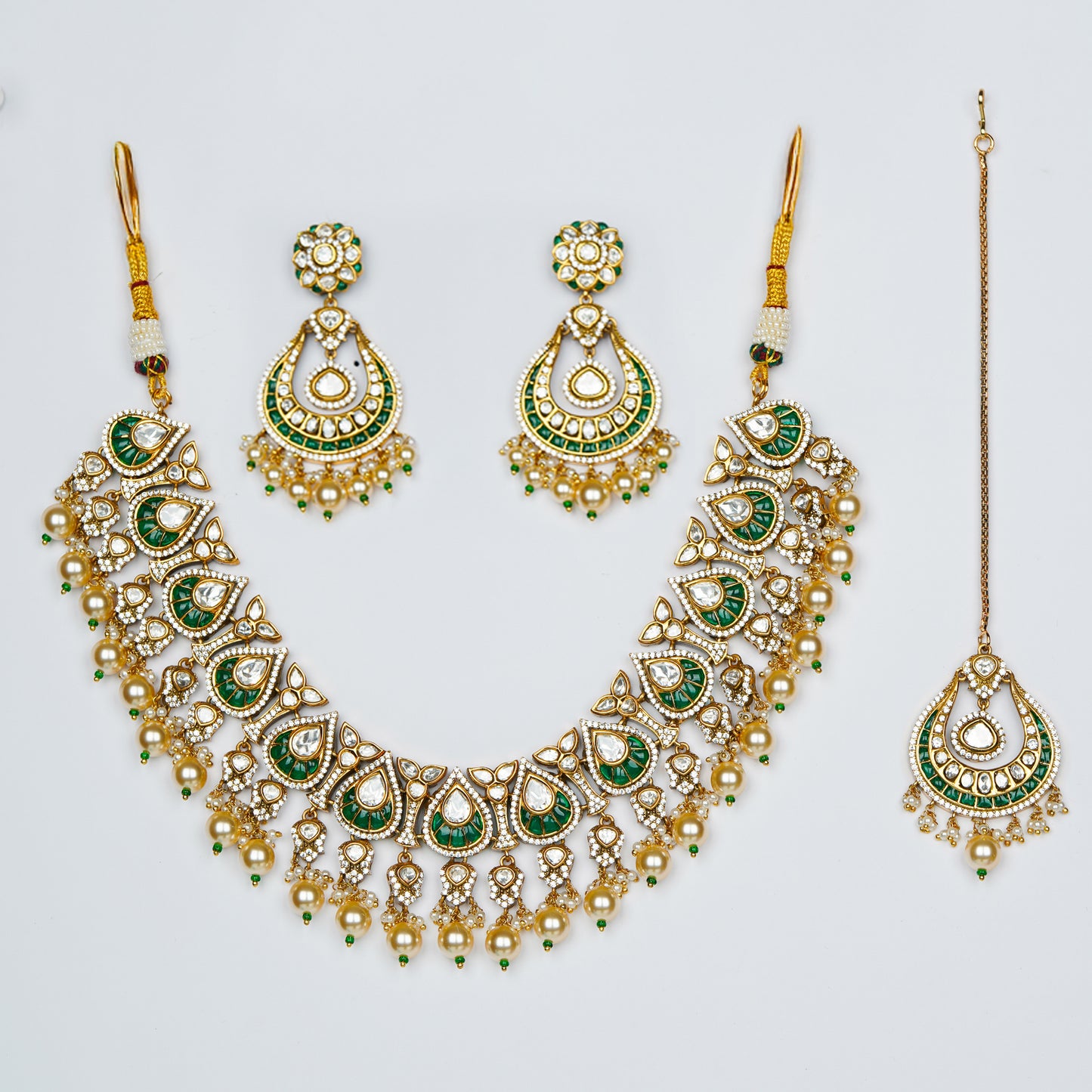 Emerald Mayura Charm Set.