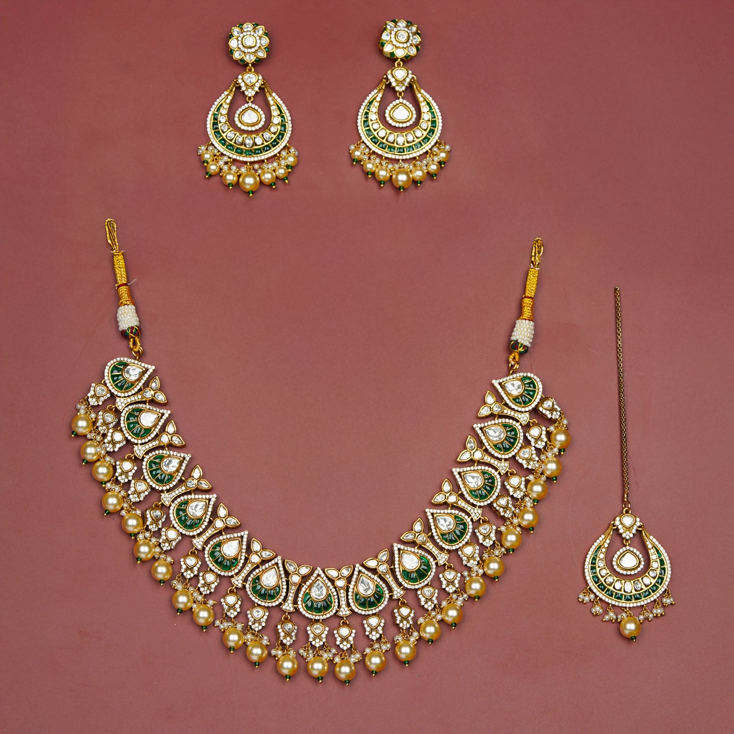 Emerald Mayura Charm Set.